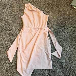 Elegant Pink One-Shoulder Dress is darker pink than the picture shows.